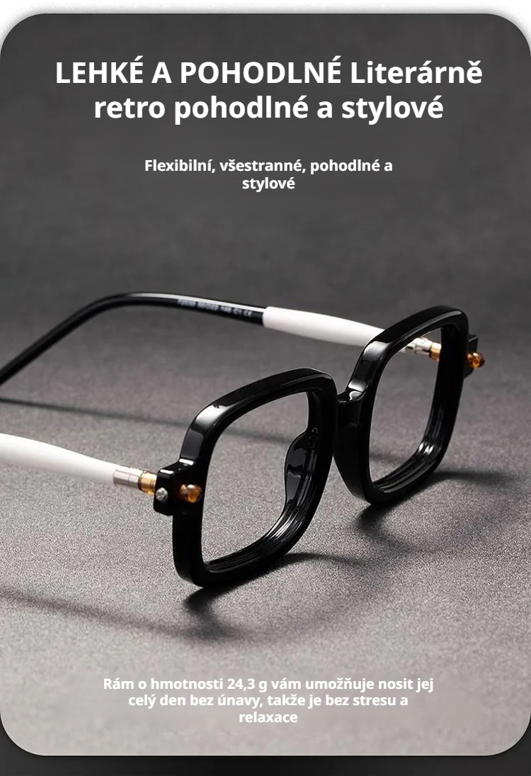 Ruční čtenářské brýle s tlustým rámem na stole