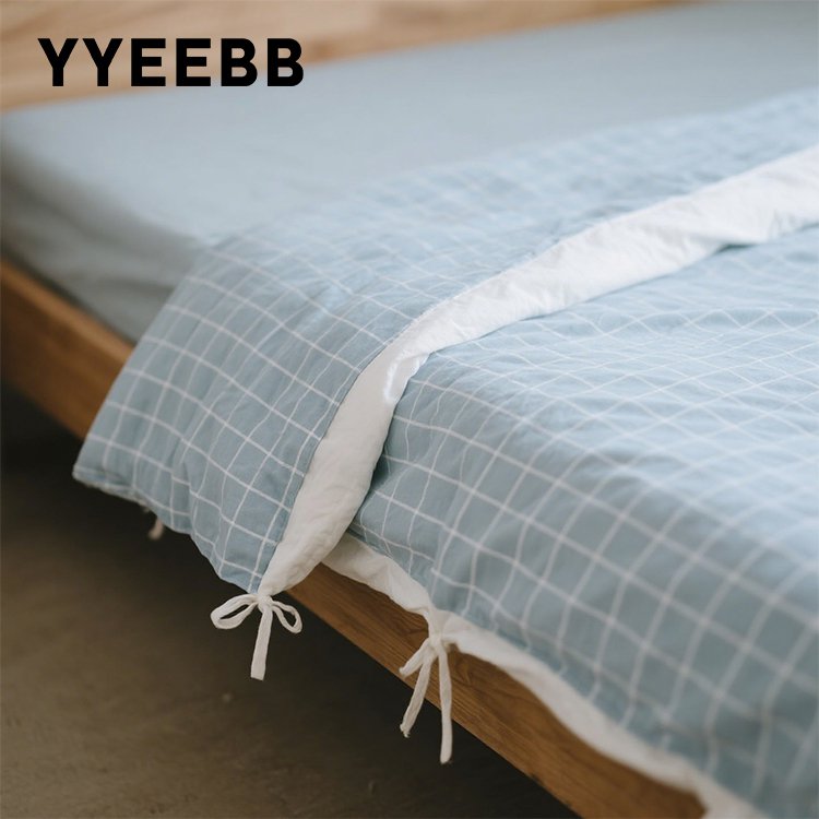 Praktyczna poszwa na kołdrę w niebieską kratę