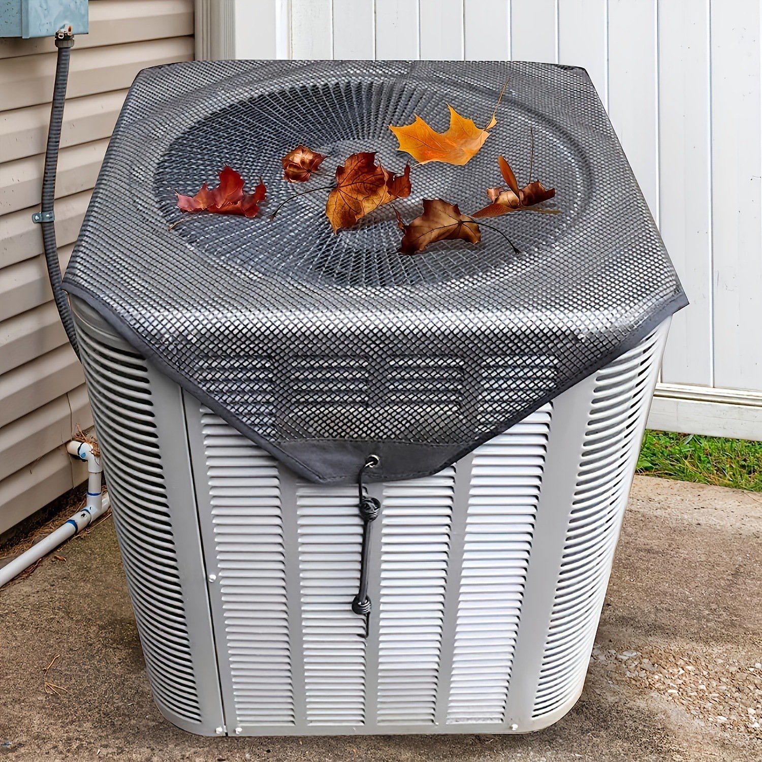 Air conditioner outdoor cover filtering fallen leaves