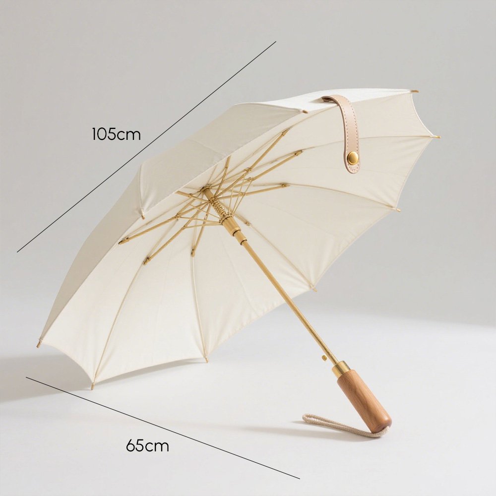 Detaliu mâner umbrelă crem modernă