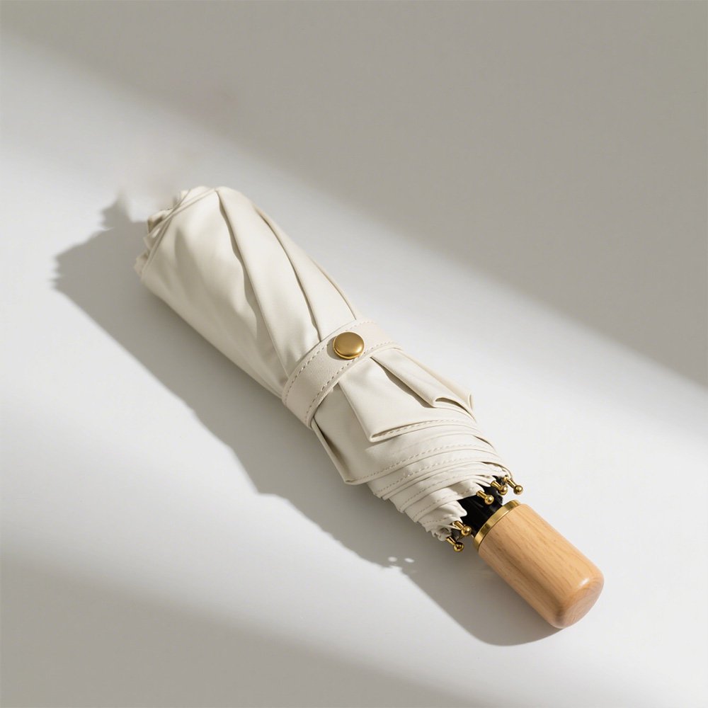 Umbrelă elegantă crem cu design contemporan