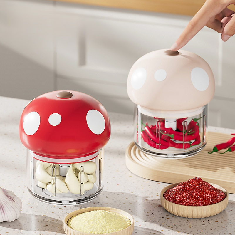 Portable electric garlic press