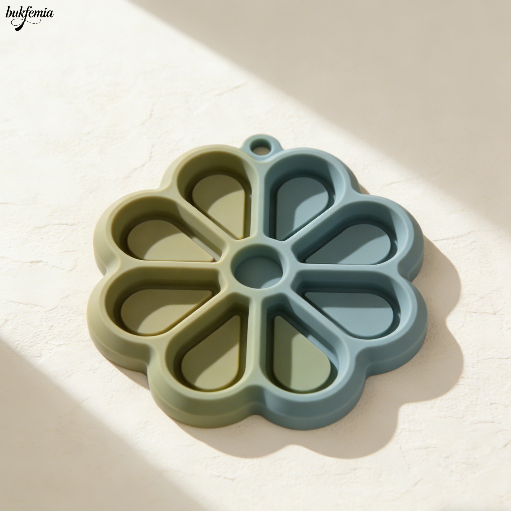 Close-up of non-slip silicone mat with flower design