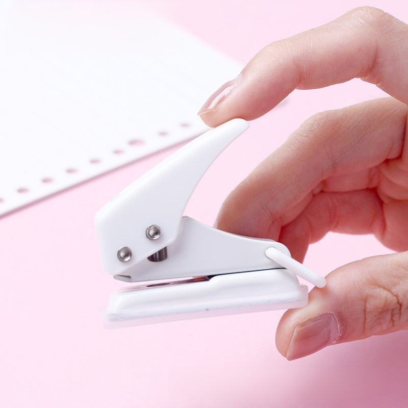 Small manual hole punch