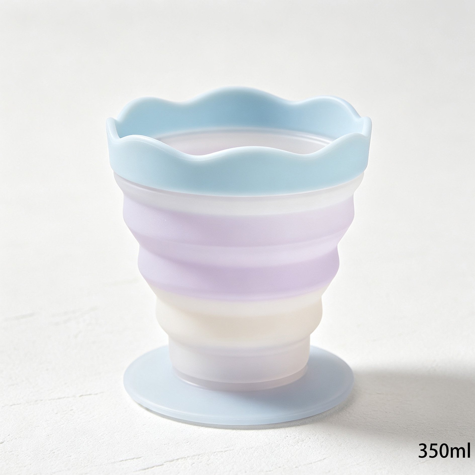 Compact folding silicone cups shown collapsed for easy storage