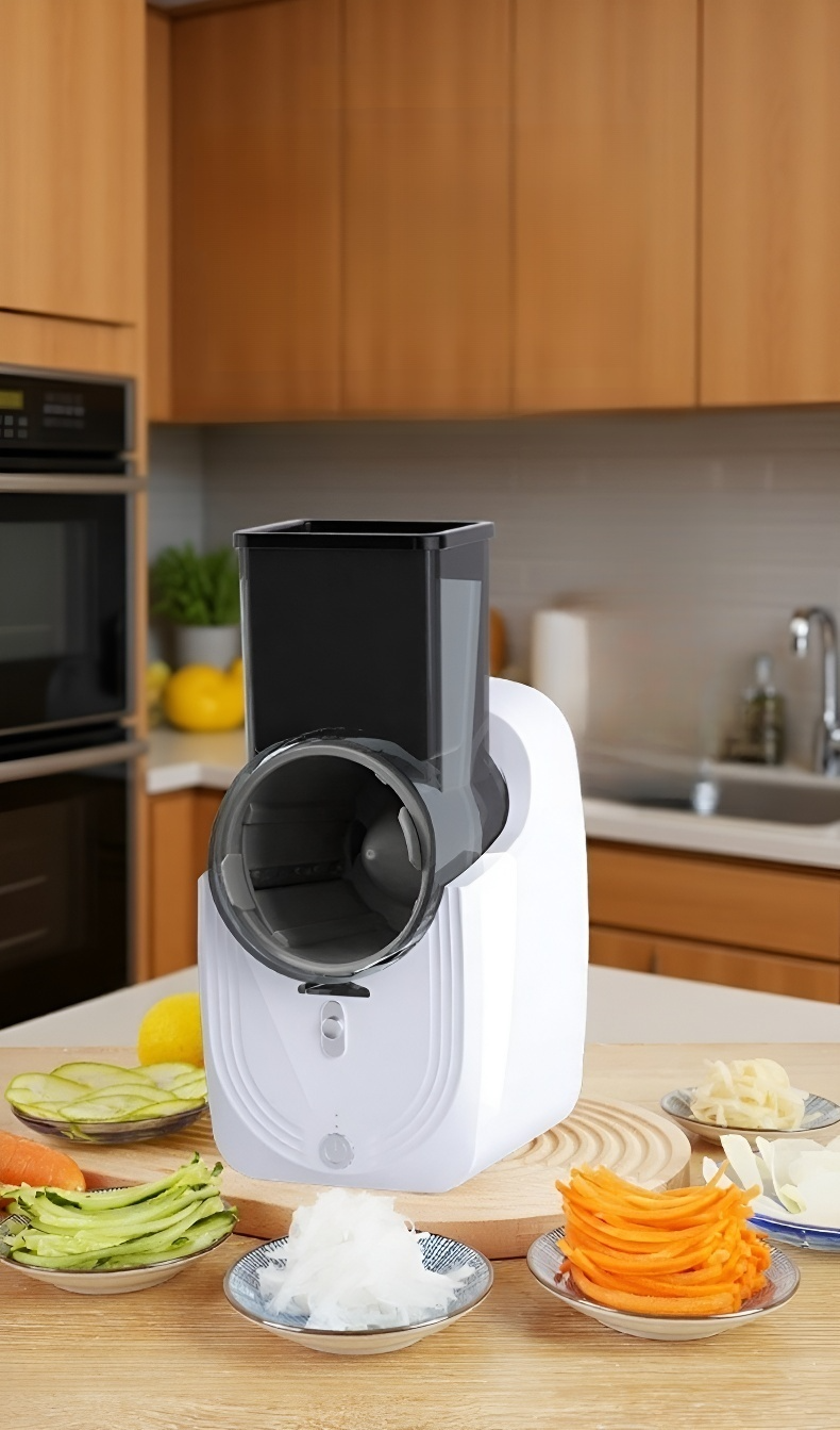 آلة تقطيع الخضار الكهربائية متعددة الوظائف على طاولة المطبخ