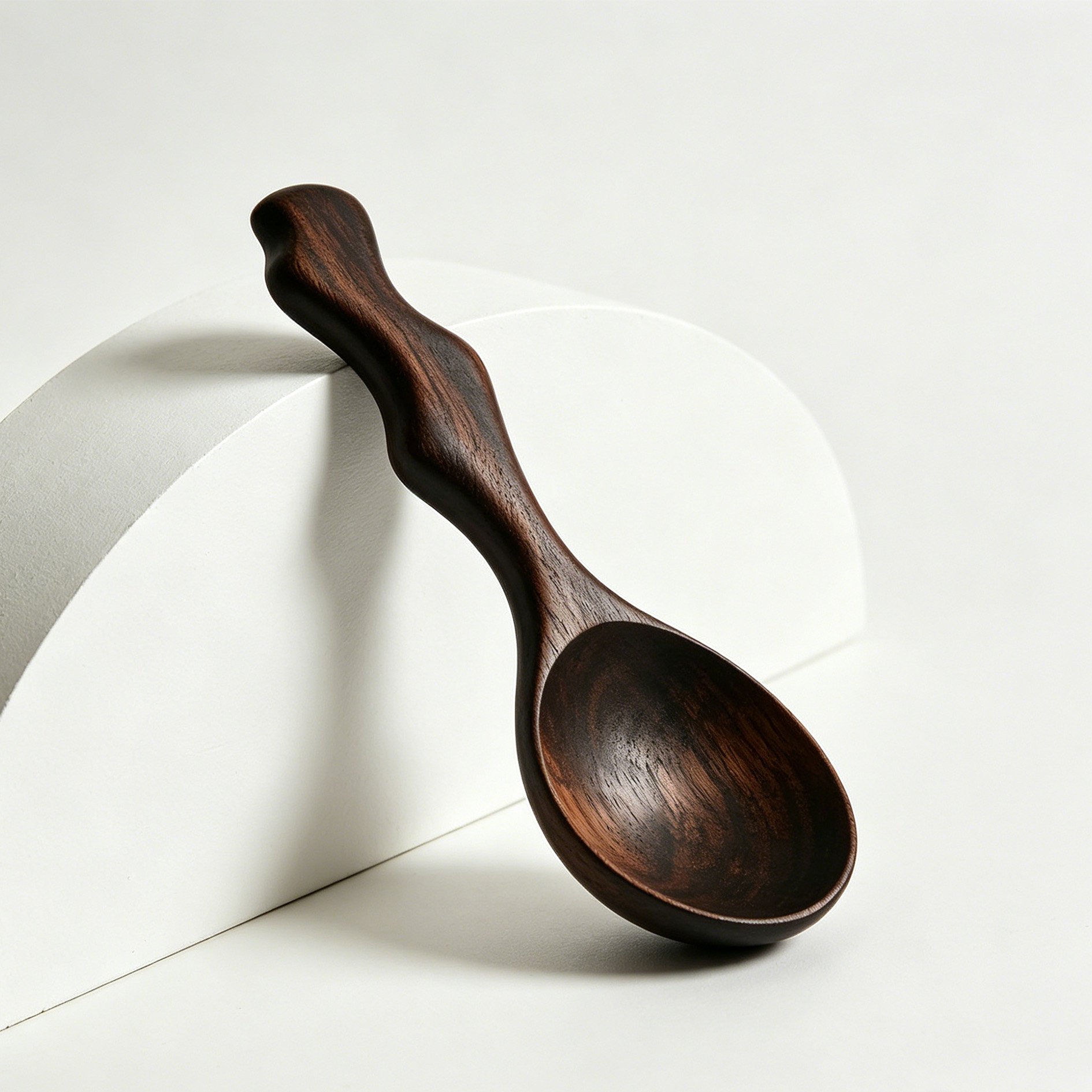 Handcrafted ebony wooden rice spoons close up