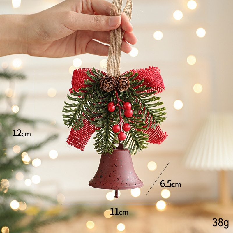 Holiday metal bell and bow ornament