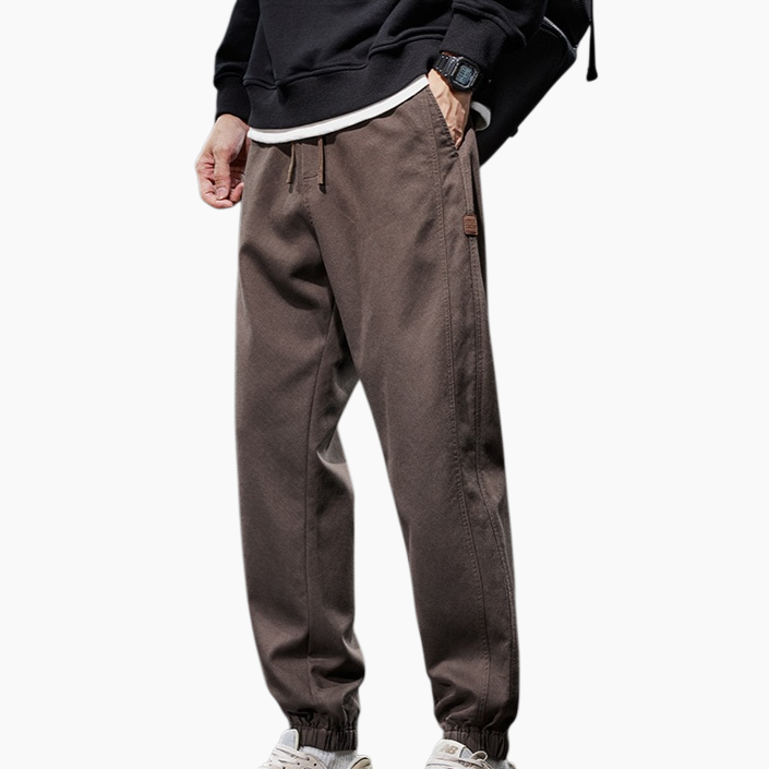 メンズ冬ドローストリングカジュアルパンツ緩いパッド入りスポーツパンツ弾性ウエスト作業服ドロップパンツ