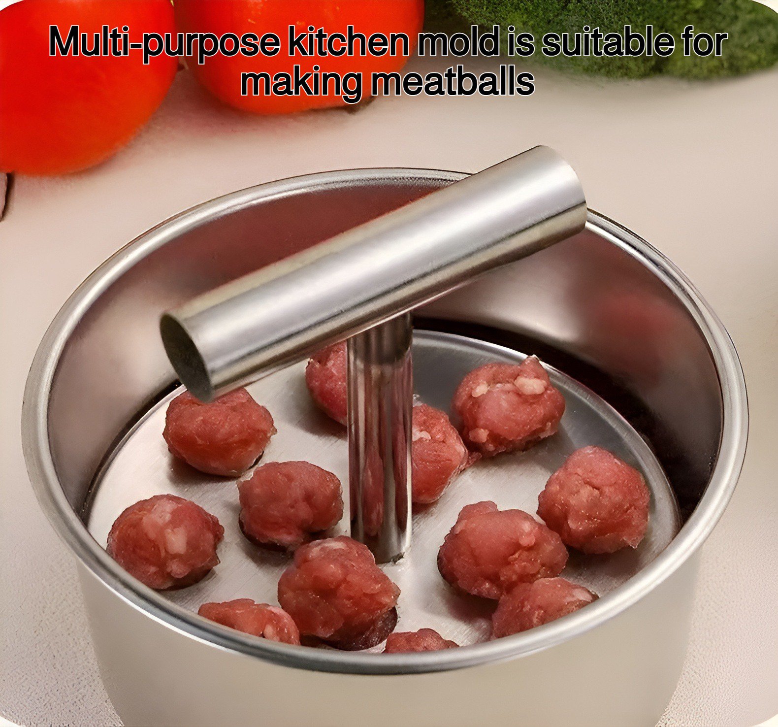 Hand holding kitchen mold making perfect meatballs