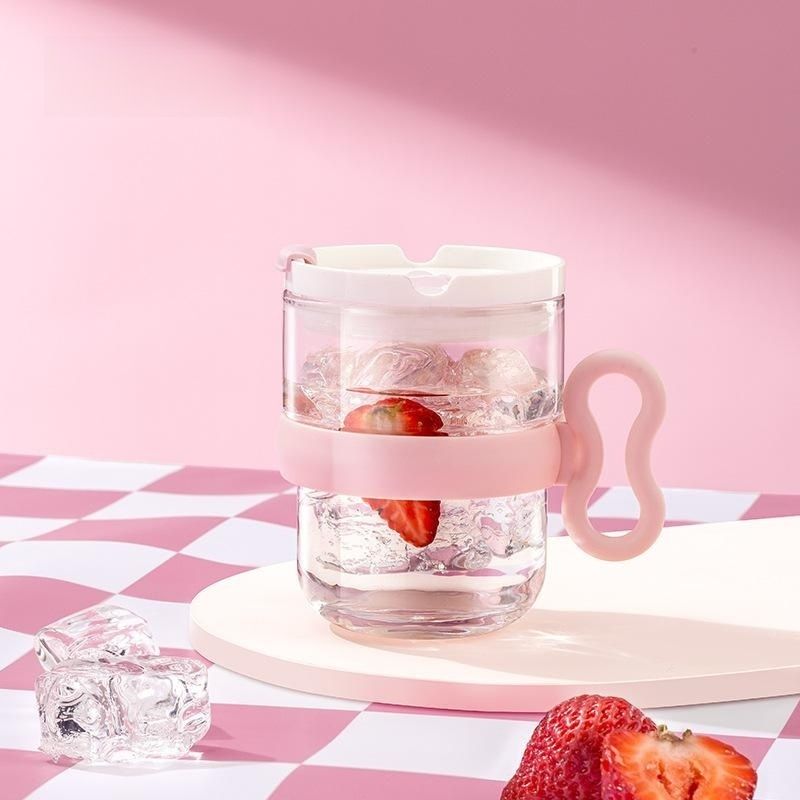 Clear glass cup with handle and lid