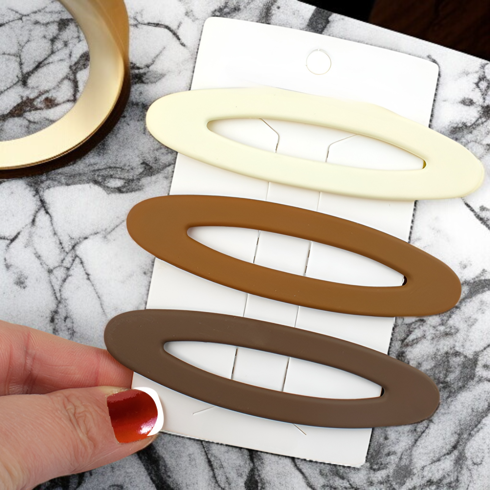 Close-up of frosted finish hair clips