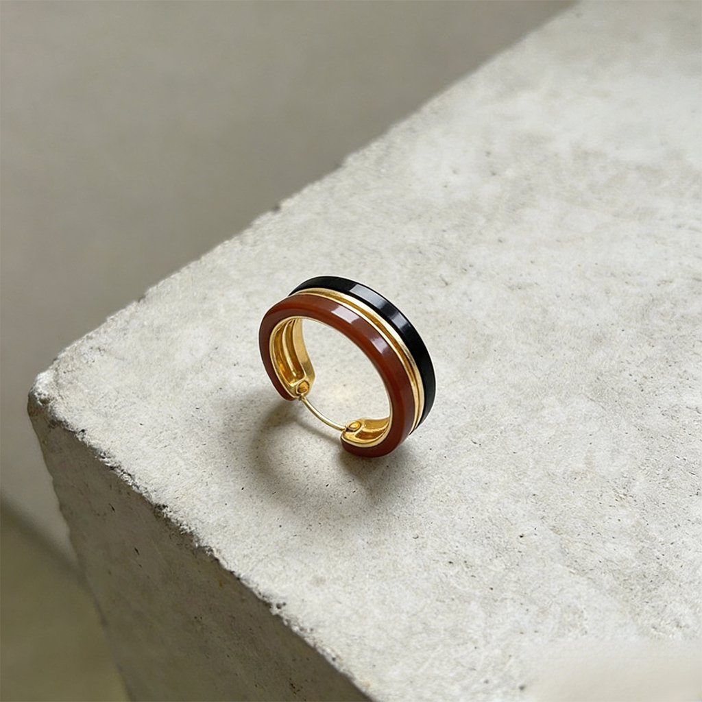 A Pair of Vintage Metal Hoop Earrings