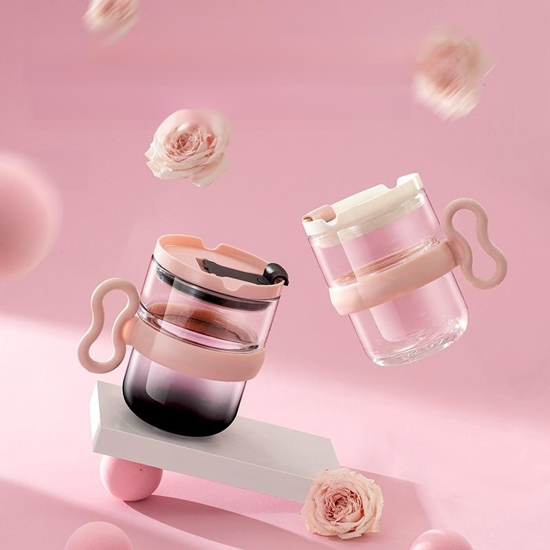 Clear glass cup with handle and lid