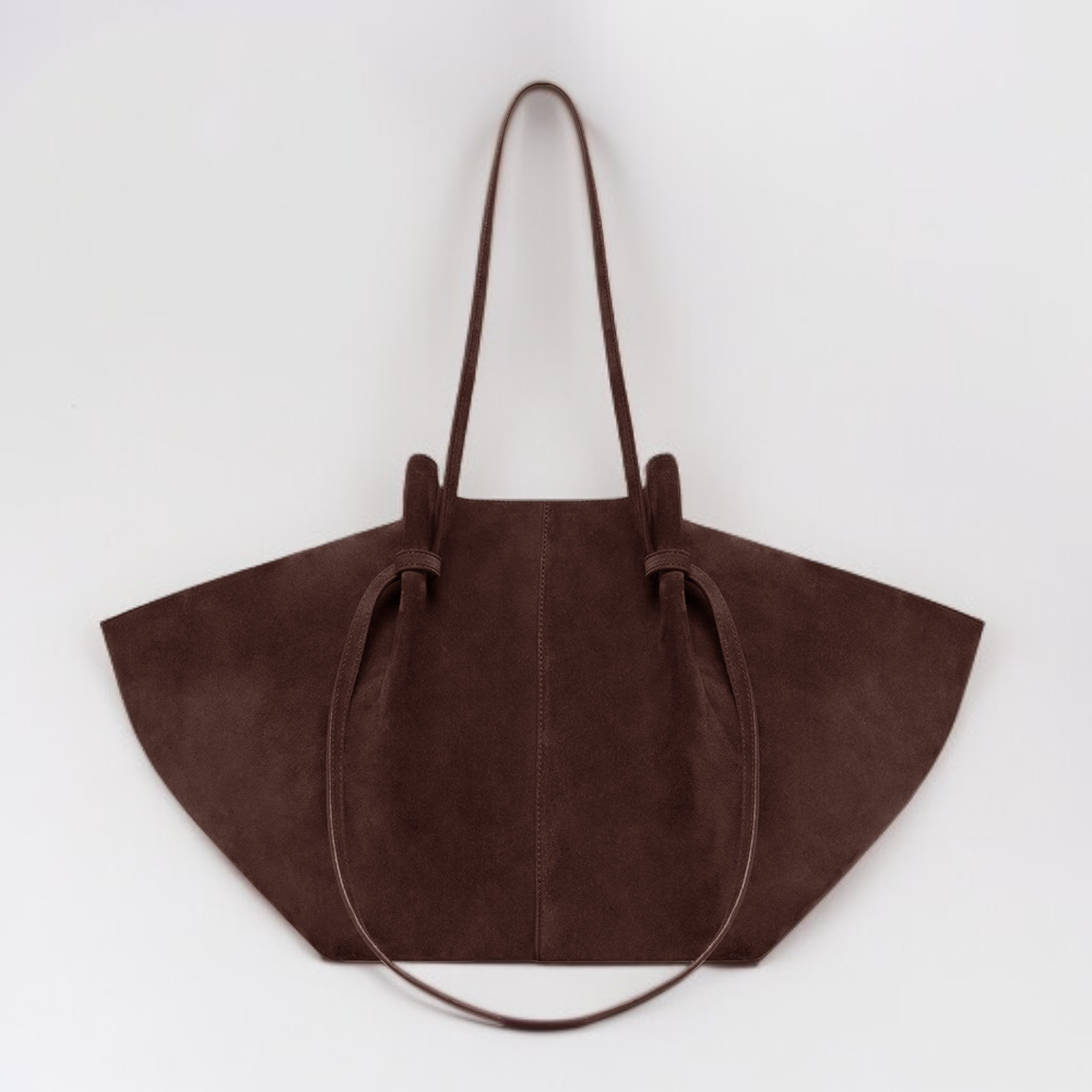 حقيبة يد كبيرة الحجم من الجلد الصناعي، تُحمل على الكتف أو تحت الإبط