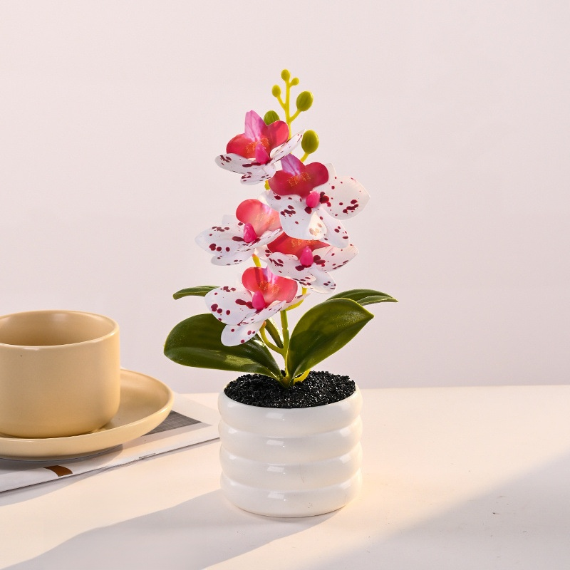 Arreglo de orquídea artificial en maceta