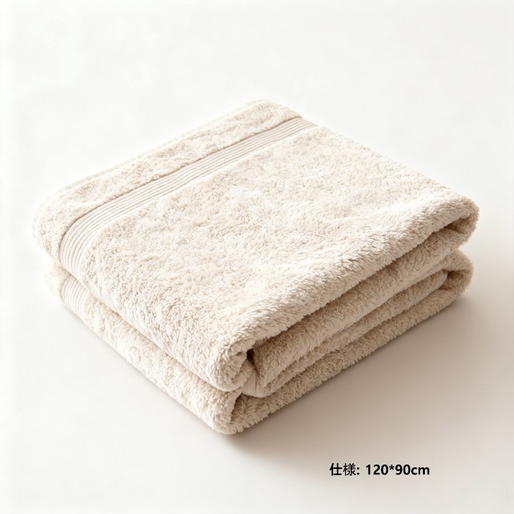 バスタオルで水分を素早く吸収する様子