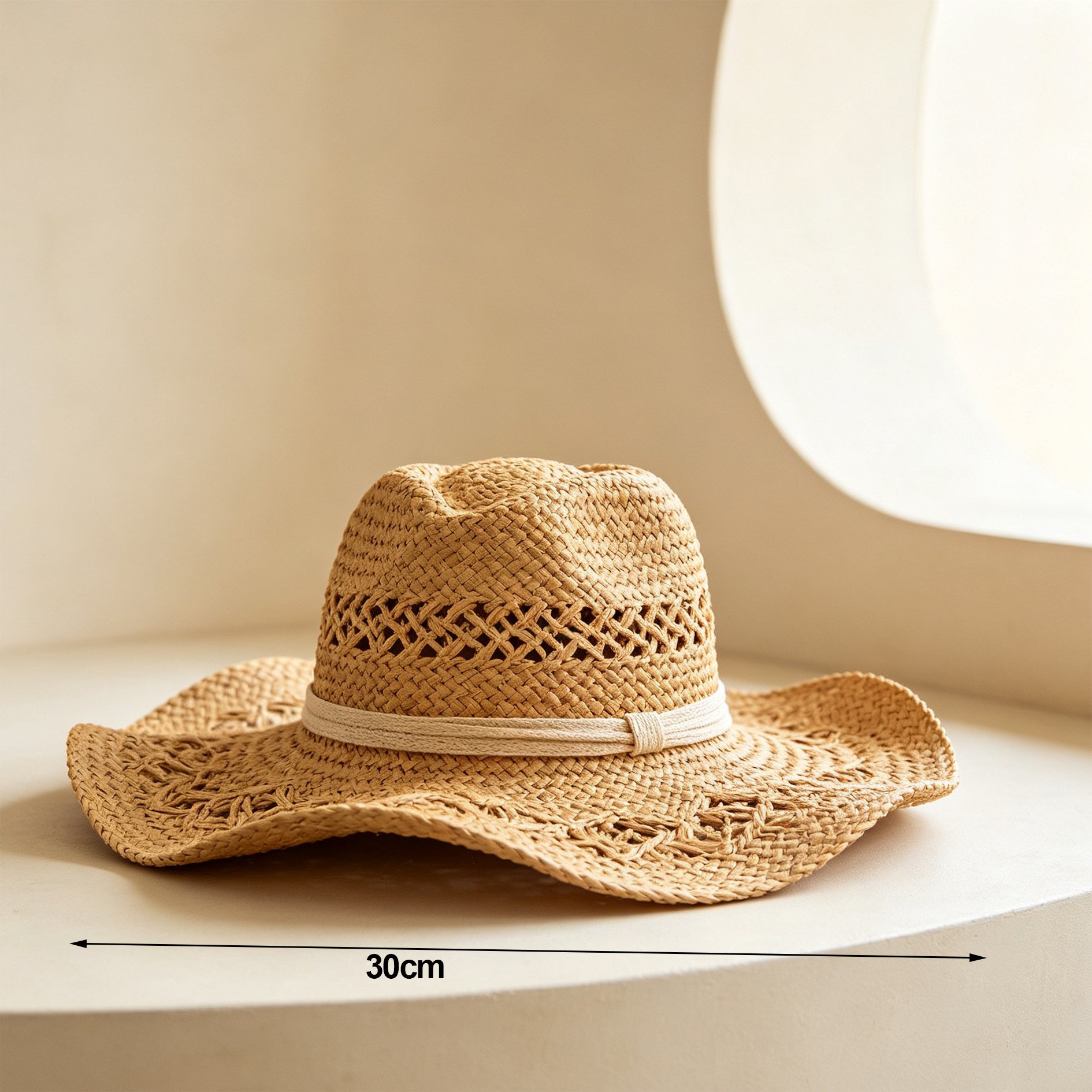 Woman wearing a woven straw hat on a sunny beach