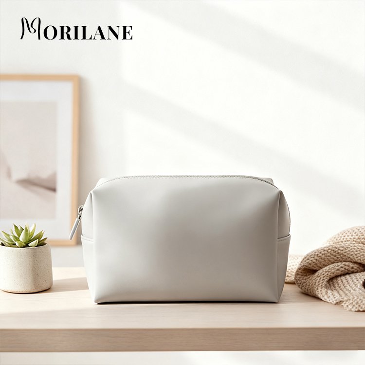 กระเป๋าเก็บของหนังสีเทา