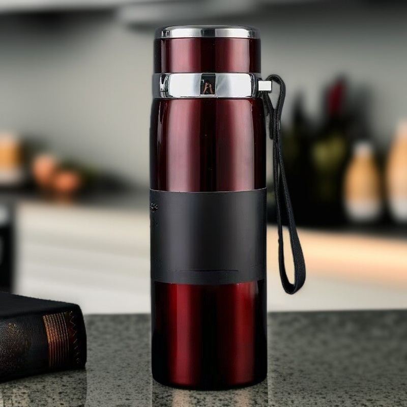 Traveler holding large sports water bottle on hiking trail