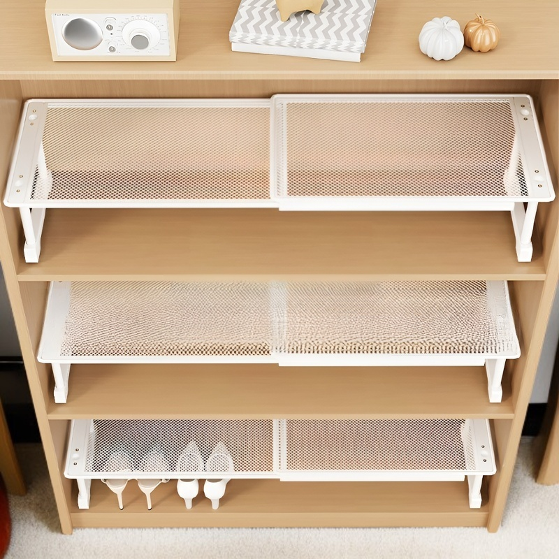 Shoe cabinet storage layered partitions retractable space-saving shoe storage artifact separation ra