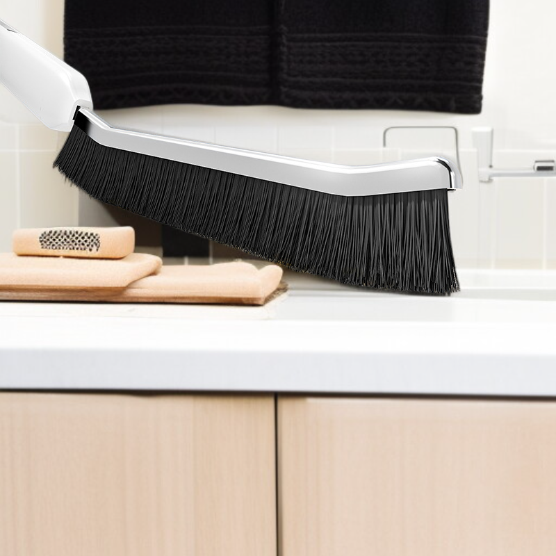 Multi-functional gap cleaning brush in kitchen