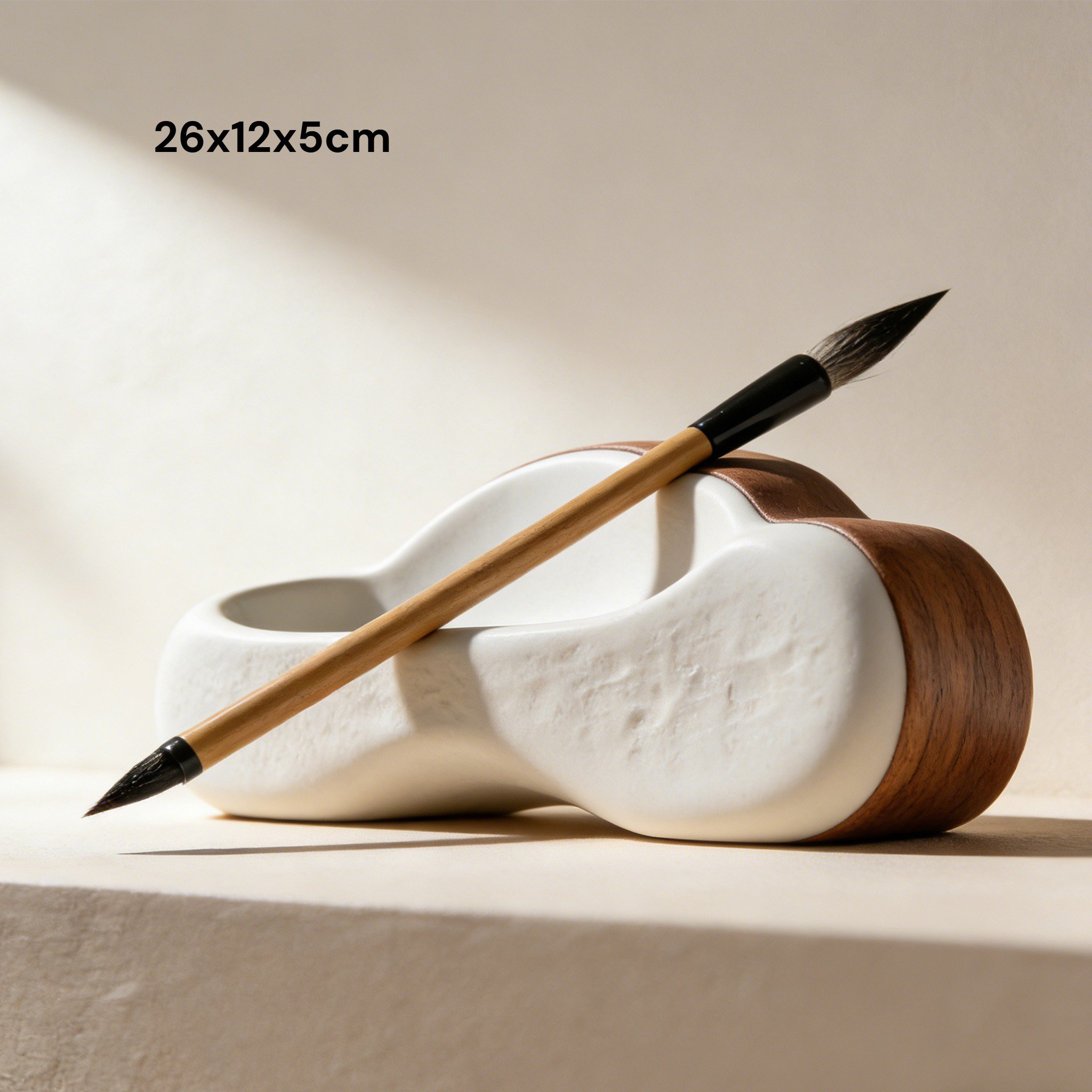 단목 문진이 책 위에 올려진 이미지