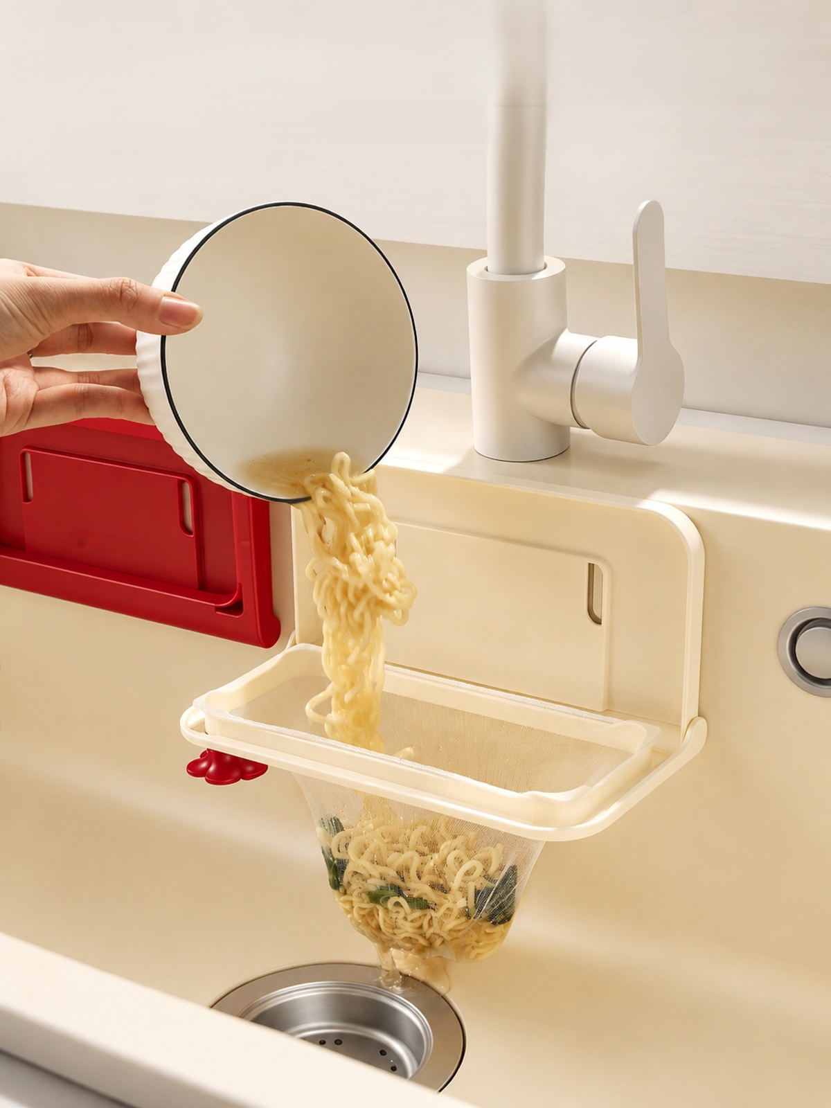 Foldable kitchen sink drainage rack holding washed dishes