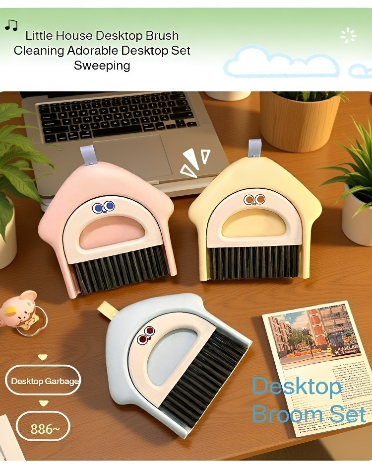 Small desktop home keyboard cleaning brush on a white background