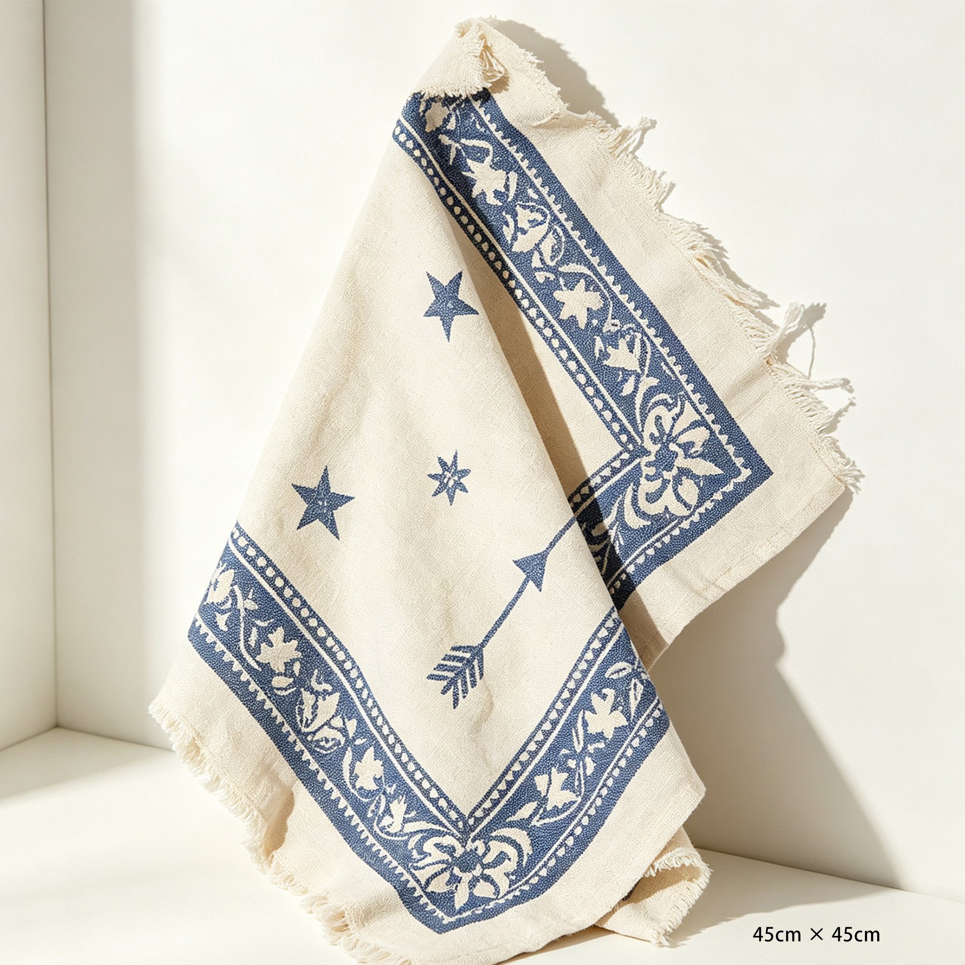 Absorbent blue tea towel hanging on oven handle