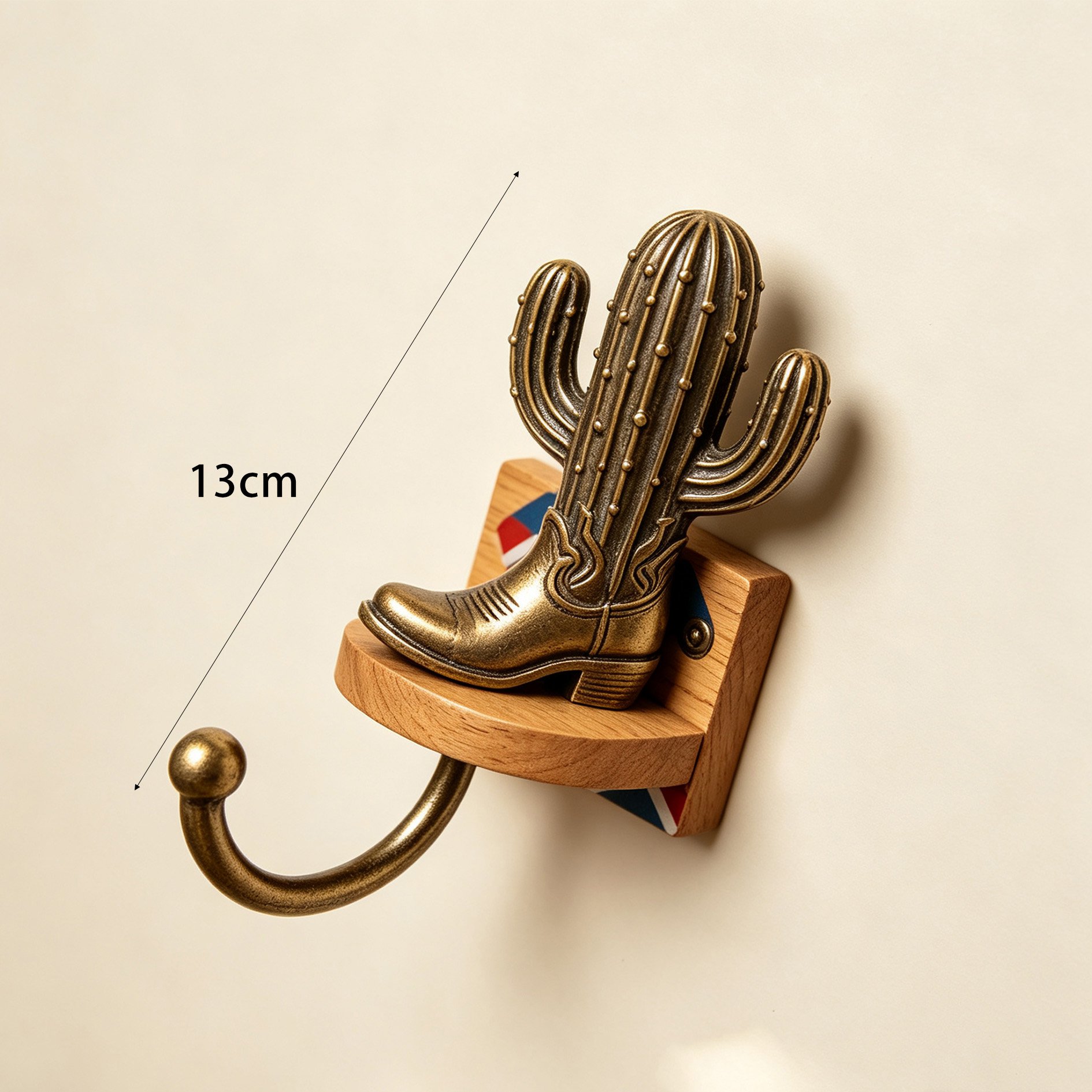 Set of metal cactus wall hooks on white background