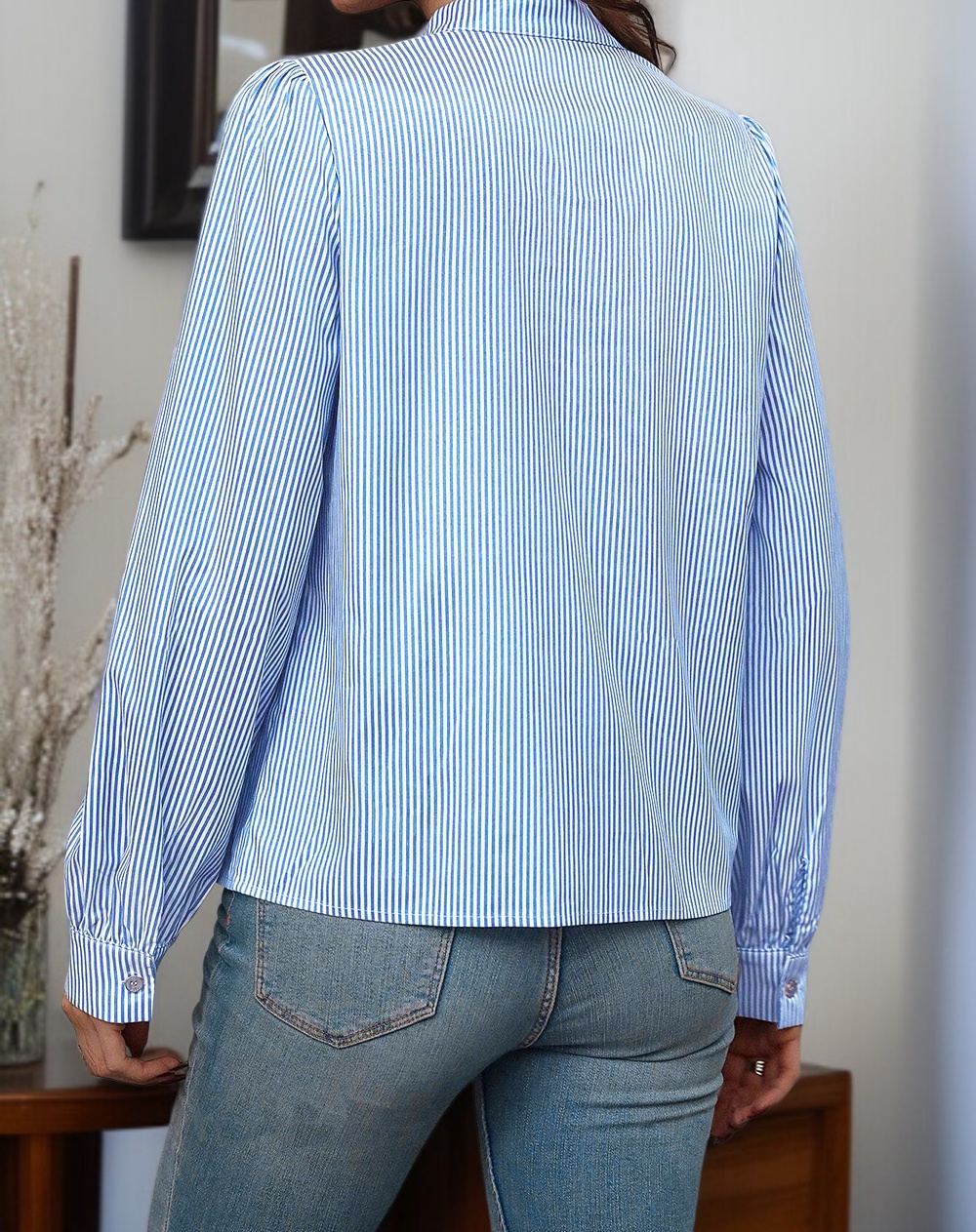 Close-up of striped pattern on women's shirt