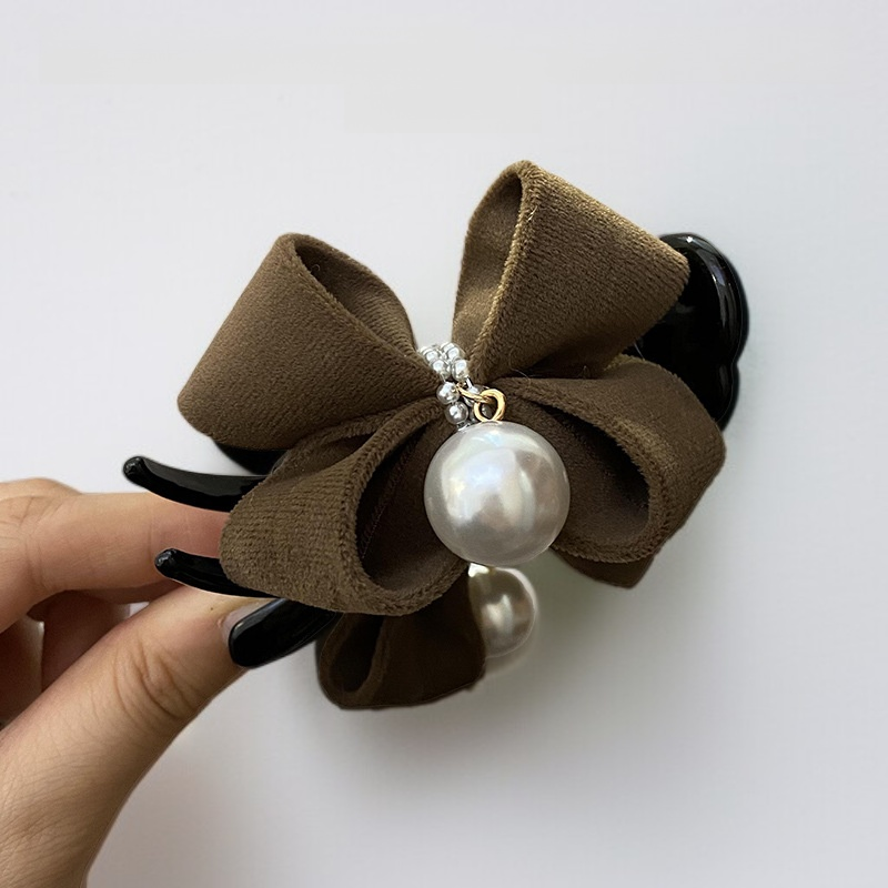 Hair clip with high ponytail