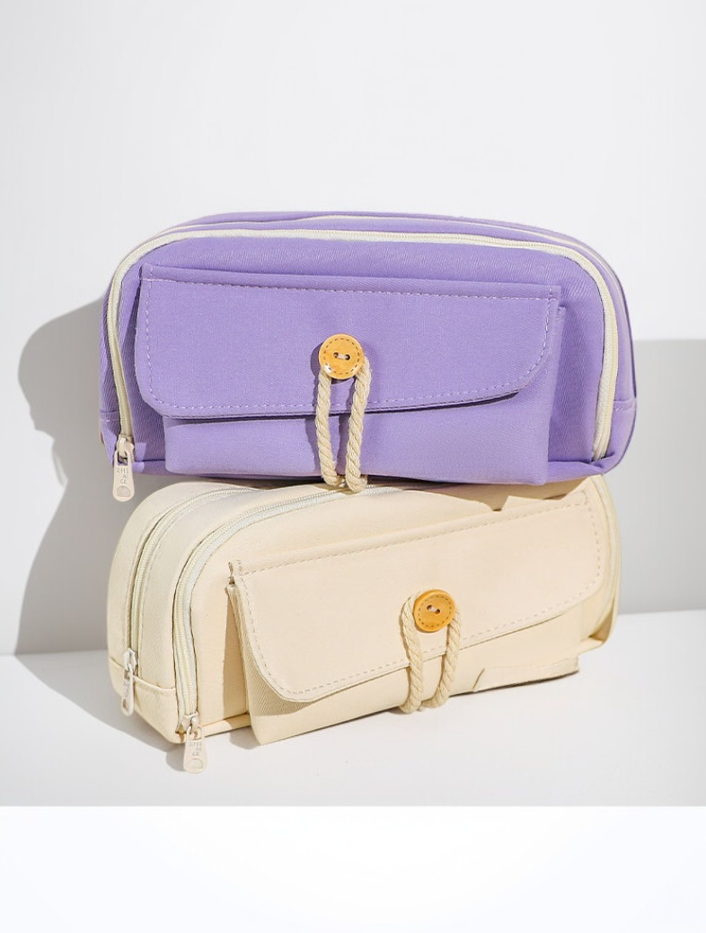 Pencil case with pens, pencils, and markers