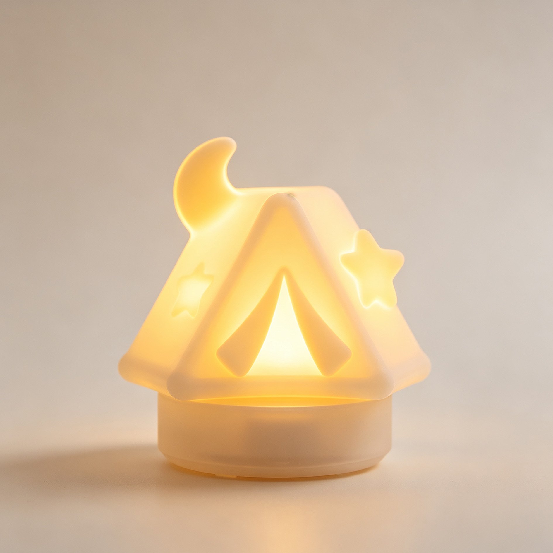 Starry Night Tent Night Light glowing in a dark room