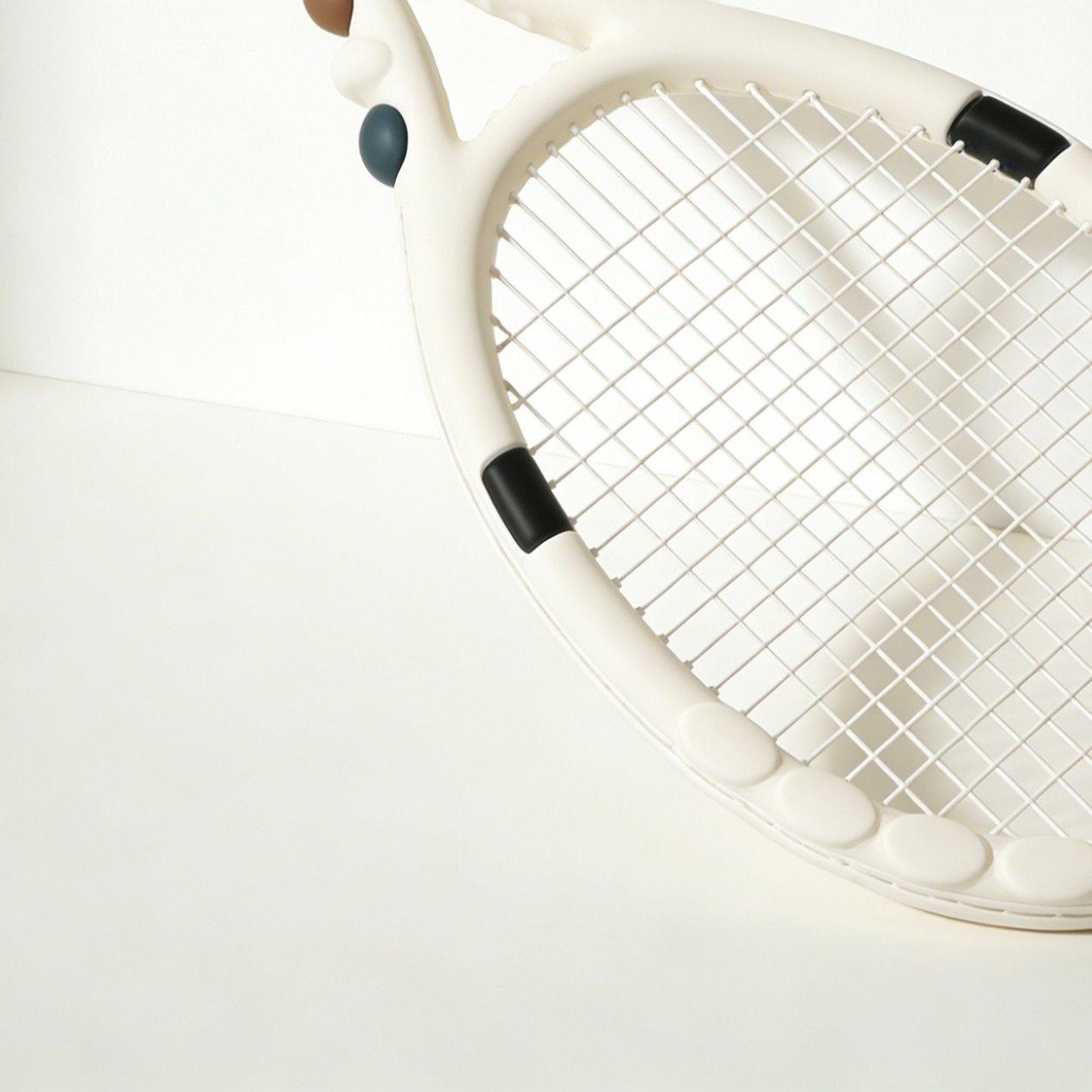 Lightweight carbon fiber tennis racket close-up