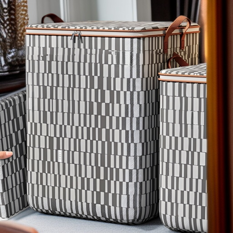 Bolsa organizadora con asas reforzadas, ideal para cambios de temporada y mudanzas