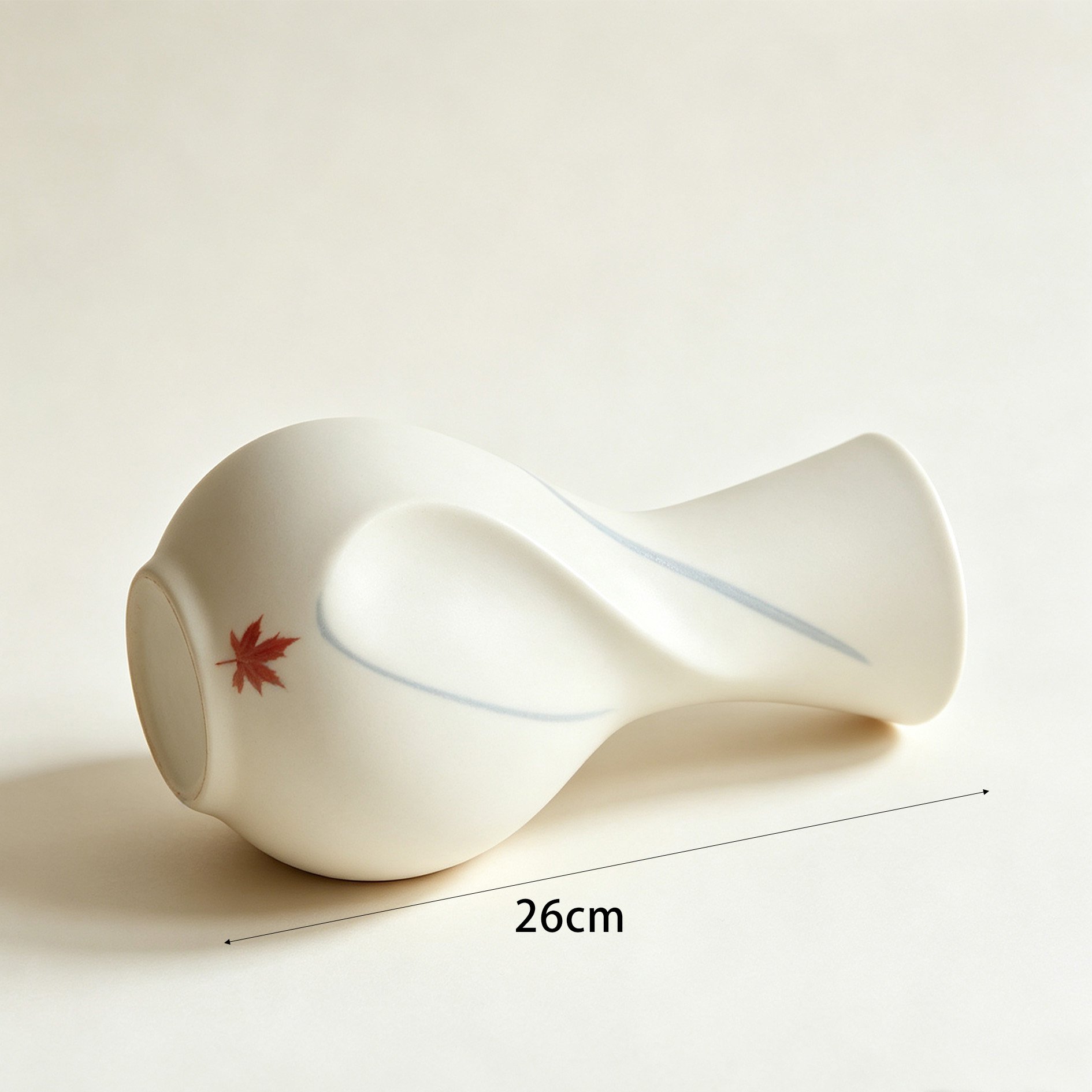 Handcrafted vase with maple leaf motif and twisted neck