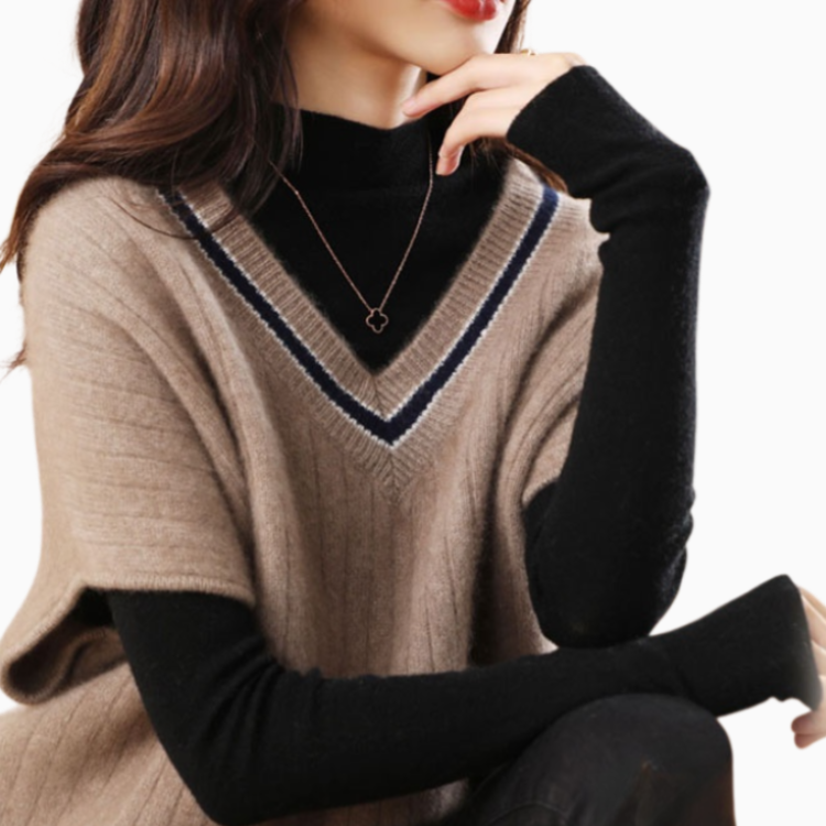 ニットの底の外にゆるいセーターの馬甲女性vネックの肩のセーターの外にゆるい馬甲がついている