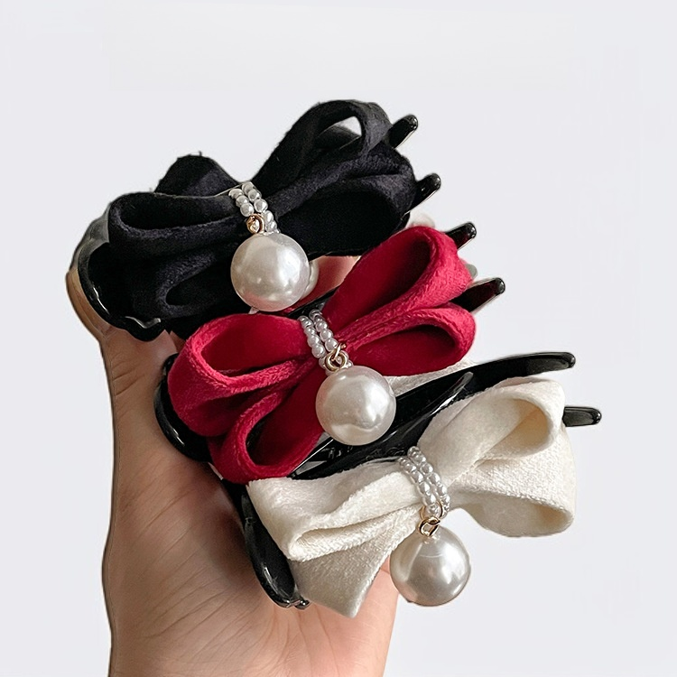 Detalle de la pinza para cola de caballo alta