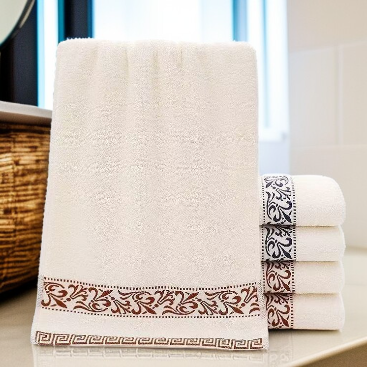 Luxury cotton face towel stacked on bathroom counter