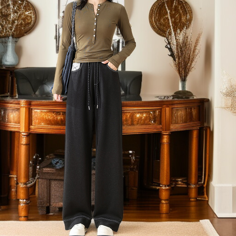 Back pocket detail of chino denim pants