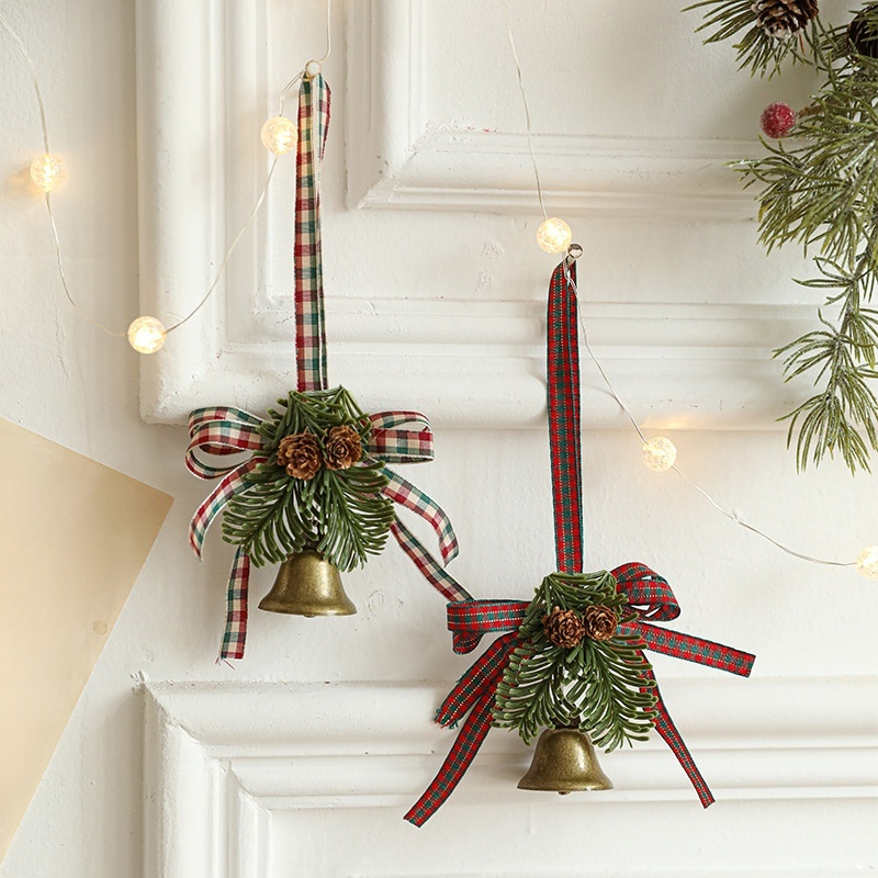 Holiday metal bell and bow ornament