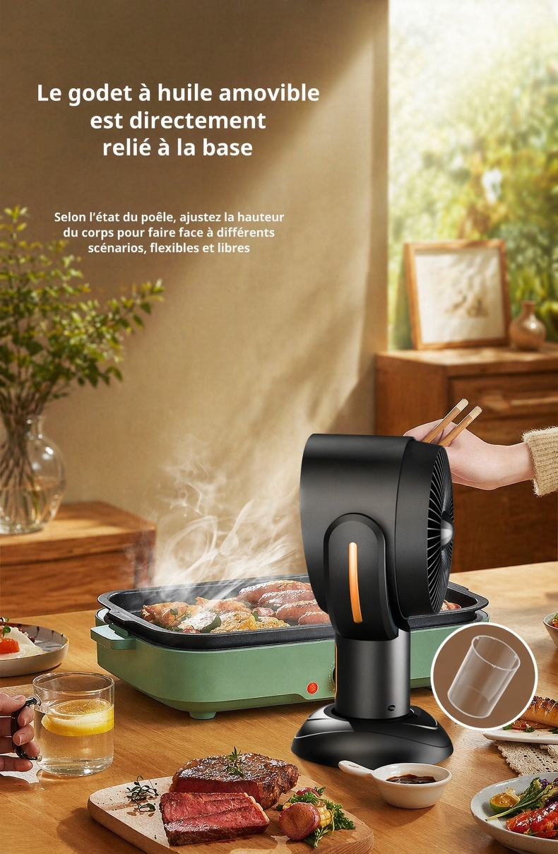 Hotte aspirante portable installée à côté d'un ordinateur
