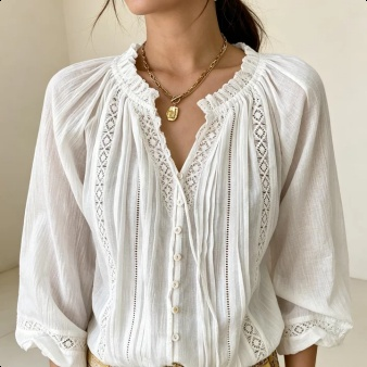 Weiße Bluse mit Lochmuster und Puffärmeln im europäischen Stil
