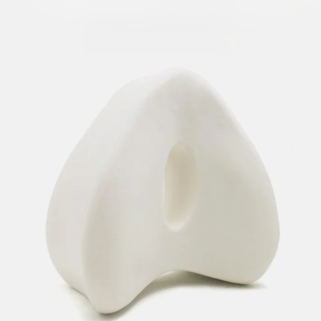 Side sleeping pillow for sleep assistance