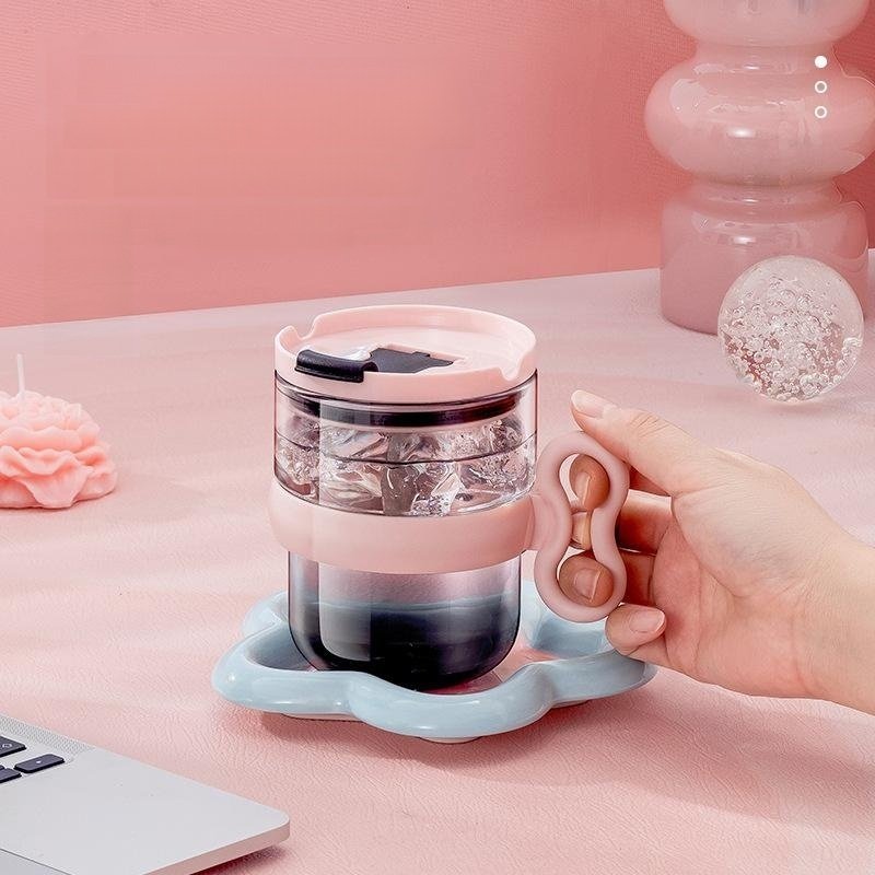 Clear glass cup with handle and lid