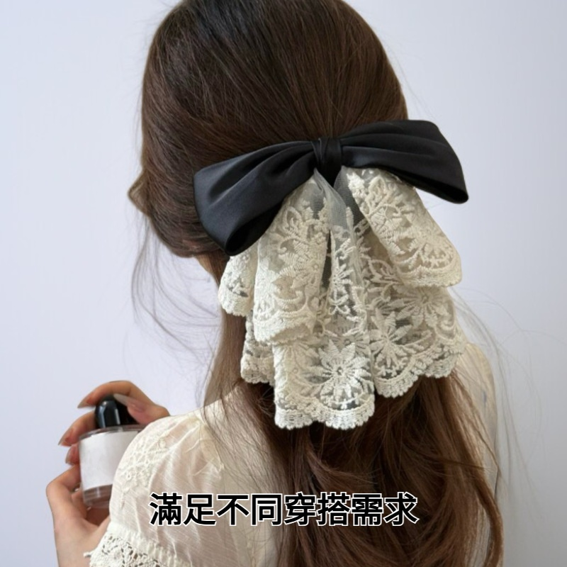 優雅蕾絲蝴蝶結髮夾細節特寫