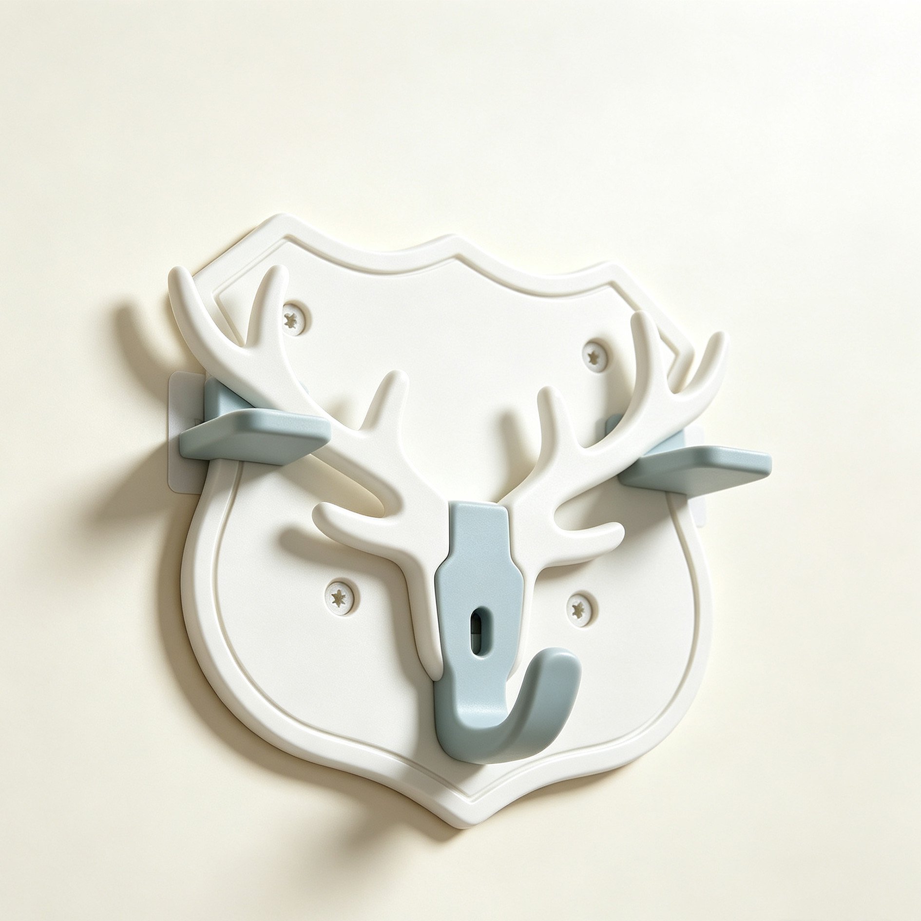 Antler Shield Hook holding a coat and hat