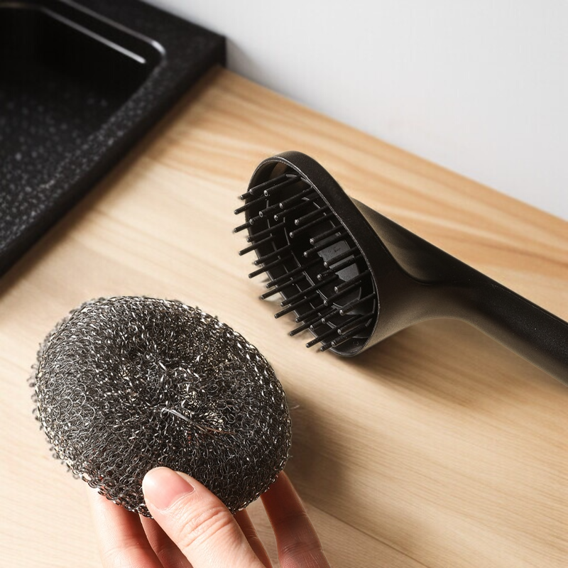 Stainless steel dishwashing brush with replaceable handle